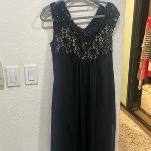 Long black dress. Inside is mini covered by longer sheer